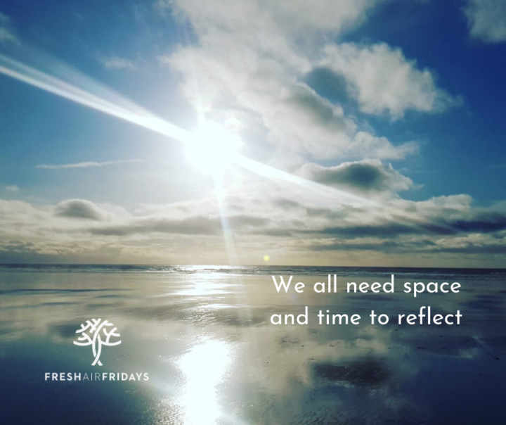 Photo of the sky with the words 'We all need space and time to reflect'.